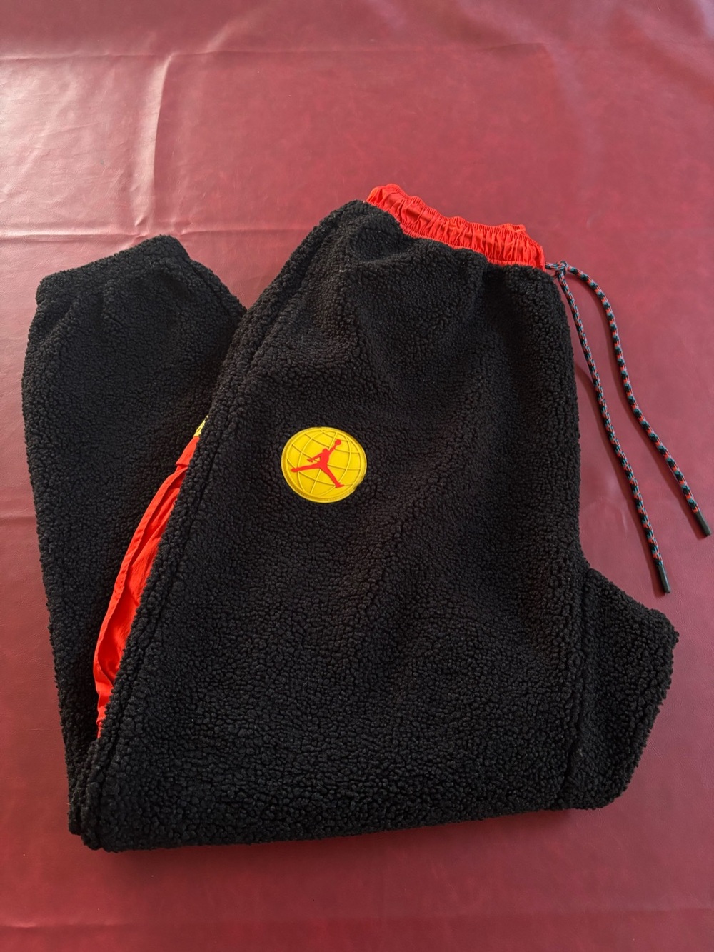 Jordan Black Sherpa Joggers with Red Waistband and Yellow Patch